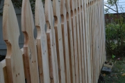 Gothic cedar board fence